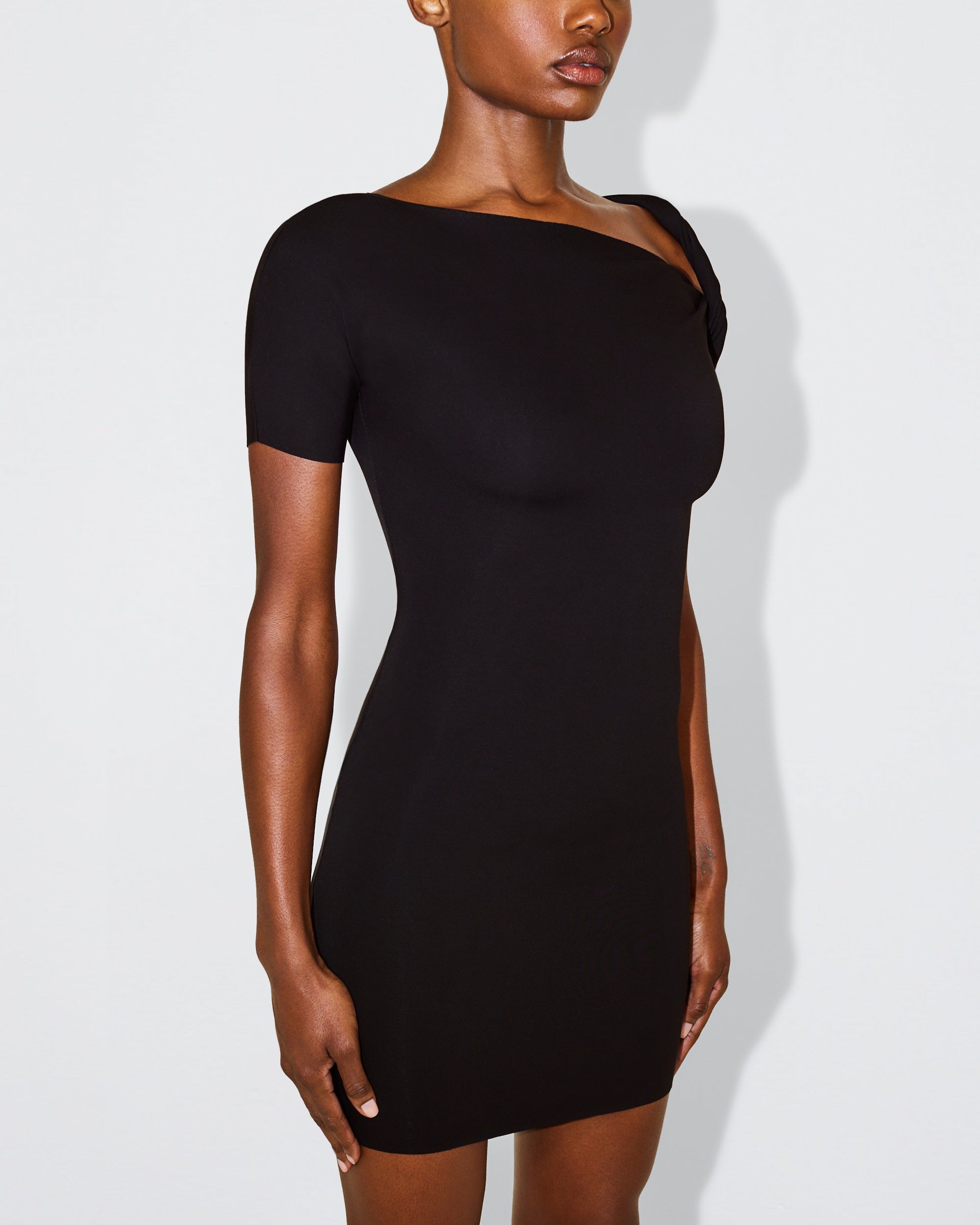 Sueded Stretch Twist Mini Dress | Black