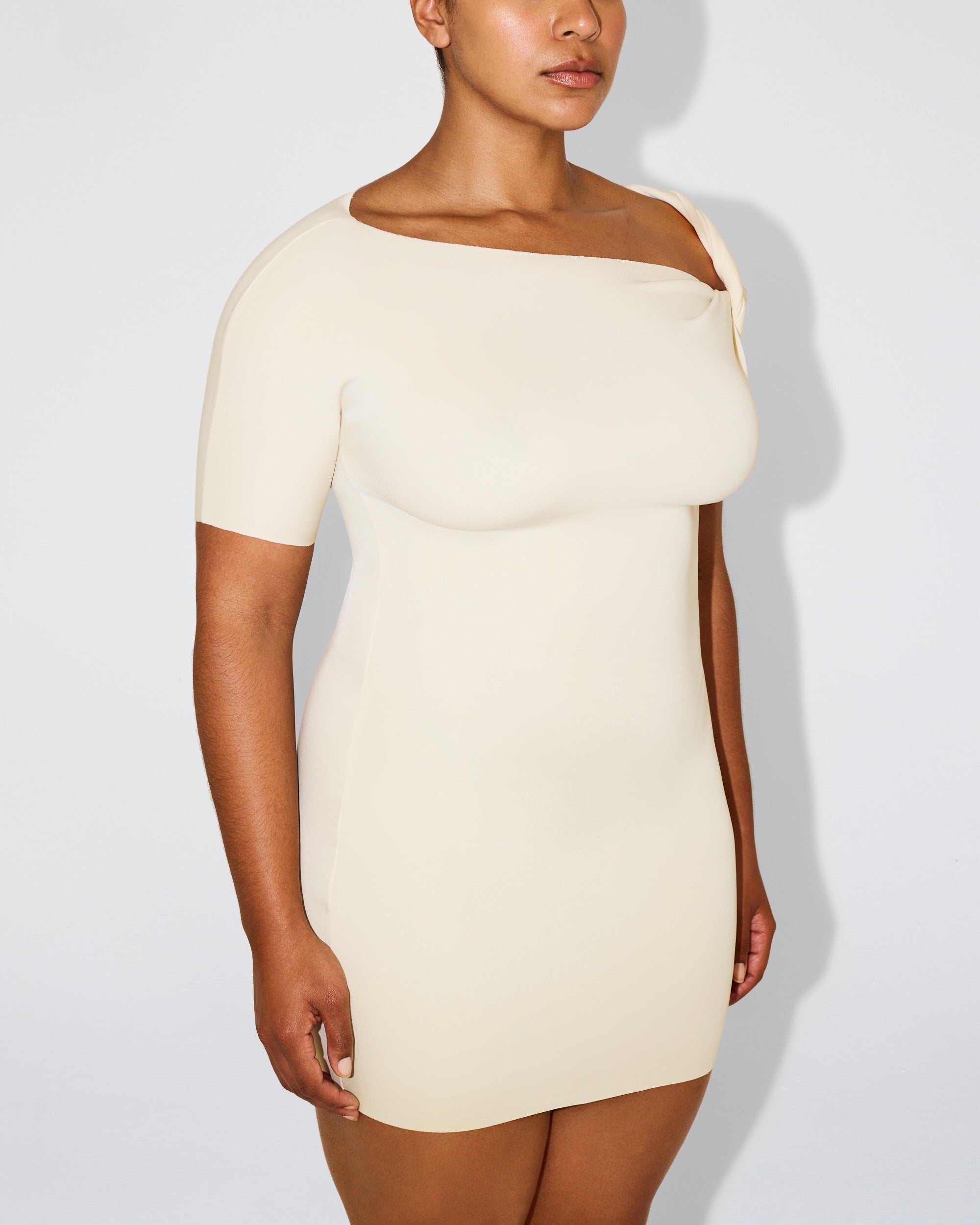 Sueded Stretch Twist Mini Dress | Stone