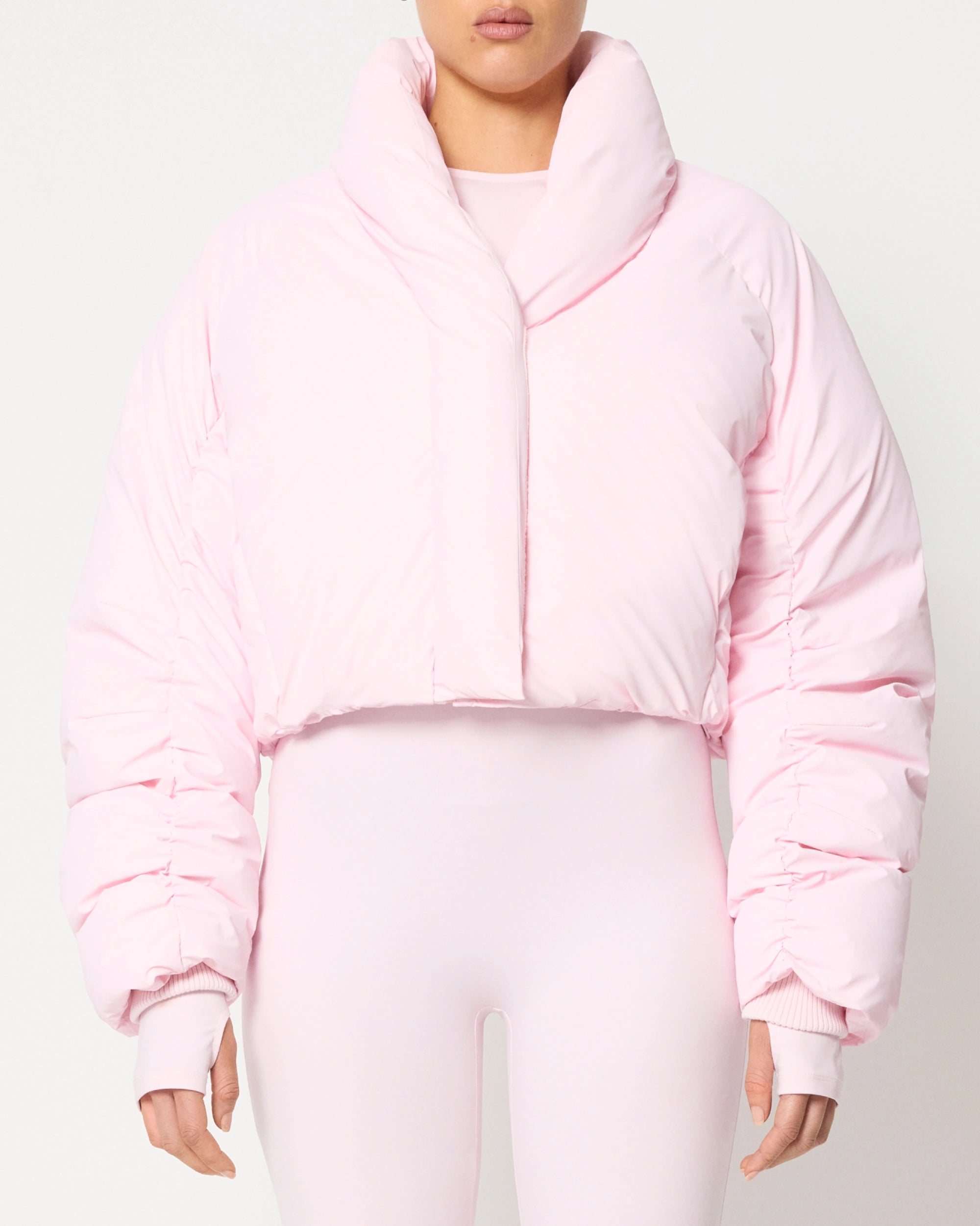 Cropped pink puffer jacket on sale