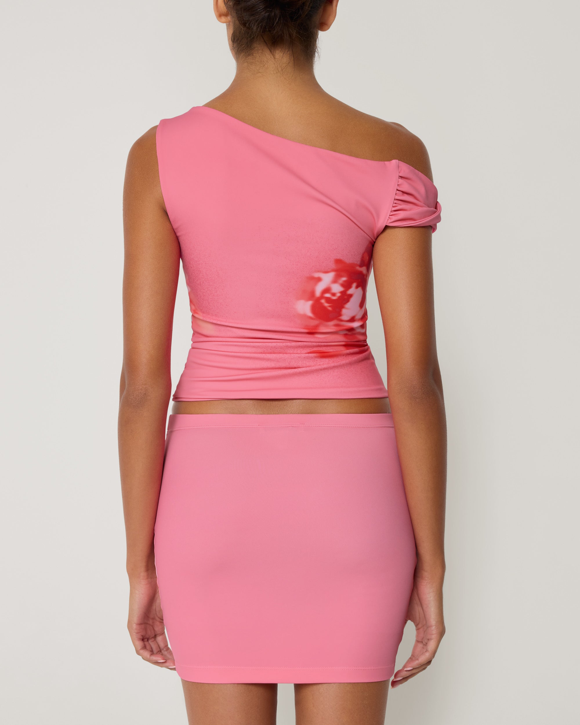 Smooth Stretch Asymmetrical Top | Pink Peony